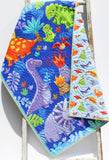 Personalized dinosaur quilt with monogram name