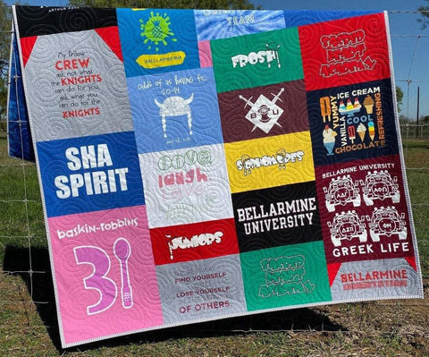 Quilt made from T-shirts featuring school and sports designs