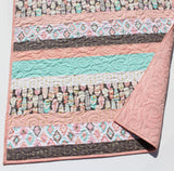 Colorful modern baby quilt and lap throw, sewn with the Striped Fun pattern – beginner PDF quilt pattern from Kristin Blandford Designs