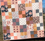 Layer cake friendly baby quilt made with the Whimsy Quilt Pattern by Kristin Blandford Designs – ideal for beginner quilters.  Homebody by Art Gallery Fabrics