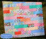 Modern strip quilt pattern by Kristin Blandford Designs featuring bright pastel fabrics and easy piecing for beginner and confident beginner quilters.