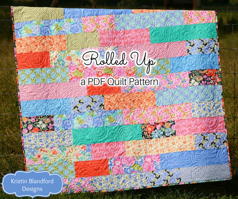 Modern strip quilt pattern by Kristin Blandford Designs featuring bright pastel fabrics and easy piecing for beginner and confident beginner quilters.