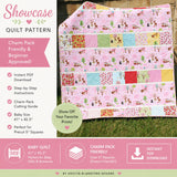 Easy floral baby quilt pattern using cottagecore flower fabrics and charm pack squares in a modern handmade nursery quilt design.