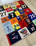 Custom blanket crafted from clothing in a modern mosaic layout

