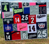 Mosaic-style custom quilt from a variety of T-shirts and sports jerseys