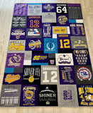 Twin size custom T-shirt quilt display  made from school and sports shirts with soft minky backing