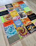 Custom keepsake quilt created from family clothing and tees