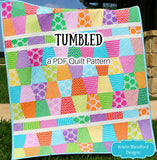 Beginner friendly Tumbled quilt pattern PDF download for baby quilts and lap quilts featuring a bright geometric tumbling block design created with 5 inch charm pack squares. This modern quilt pattern by Kristin Blandford Designs is ideal for colorful fabric collections, stash busting, precut quilting fabric, and easy handmade quilt gifts.