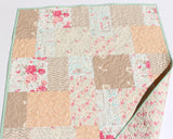 Neutral farmhouse quilt kit featuring soft vintage style fabrics designed for throw and twin quilts perfect for cozy bedroom or living room decor