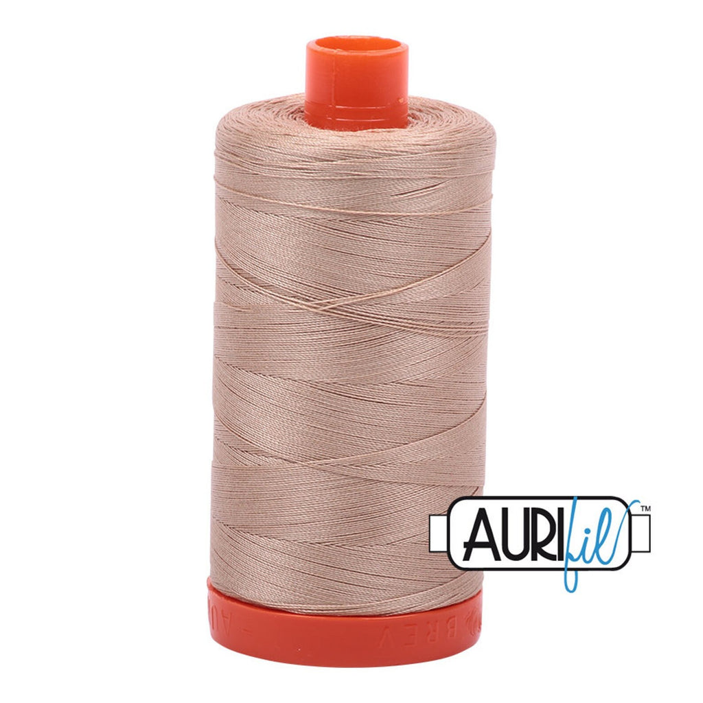 Aurifil 2314 Beige tan ivory sand stone MAKO 50wt cotton quilting thread 1300m spool for piecing, quilting, binding, sewing, machine quilting, quilt kits, baby quilts, throw quilts, neutral fabrics, floral prints, and patchwork projects from Kristin Blandford Designs.