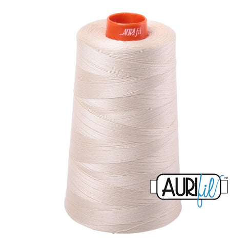 Aurifil 2310 Light Beige MAKO 50wt cotton quilting thread 5900m cone for piecing, quilting, binding, sewing, machine quilting, longarm quilting, quilt kits, baby quilts, throw quilts, neutral fabrics, floral prints, light backgrounds, and patchwork projects from Kristin Blandford Designs.
