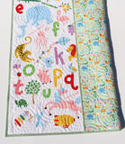Learning quilt kit with ABCs and animals, bright primary colors, educational and decorative for baby blankets.