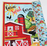 DIY baby quilt kit with cheerful farm scene panel, coordinating backing fabric, and bright yellow binding for toddler blanket.