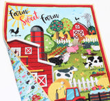 Country barn animal quilt sewing kit, easy toddler blanket project with tractors, barnyard animals, and quilter-friendly fabrics.