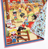 Cowboy rodeo panel quilt kit showing colorful ranch town, cowboys on horseback, rodeo fun, and coordinating quilt fabrics.