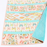 Striped quilt sewing kit designed for a DIY baby nursery blanket