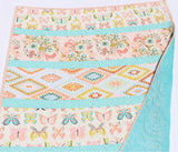 Ready to ship baby quilt blanket in Butterfly Posy design with modern quilting texture