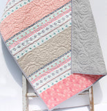 Beginner friendly baby blanket quilt kit in pastel color palette