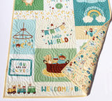 Custom baby boy nursery quilt with professional quilting and storybook style design