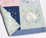 Custom Twinkle Little Star nursery quilt with gentle celestial artwork