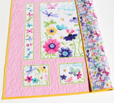 Embroidered baby name blanket created from a handmade butterfly quilt