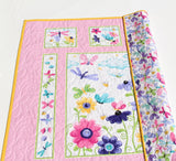 Embroidered baby blanket featuring lilac butterfly quilt design