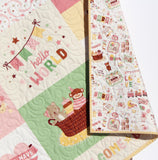 Baby shower gift quilt personalized with embroidered baby name