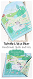 Panel based baby quilt kit offering a professional look with simple construction