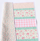 soft pastel quilt kit with floral prints and gentle mint green sashing