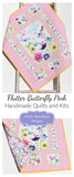 Butterfly quilt panel sewing project with coordinated pink floral fabrics