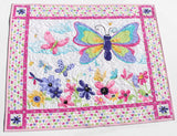 Large butterfly quilt panel with floral garden artwork for a baby floor quilt