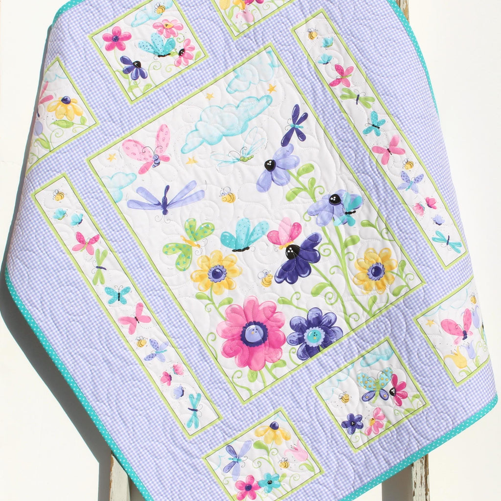 Personalized butterfly baby quilt with embroidered name and lilac floral design