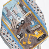 Handmade baby boy construction quilt featuring diggers, excavators, and trucks in a modern nursery color palette, designed by Kristin Blandford Designs for construction-themed baby rooms and unique baby shower gifts