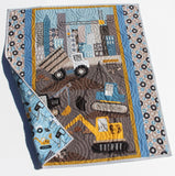 construction themed baby quilt kit with bold colors and coordinating fabrics perfect for making a nursery quilt or toddler blanket