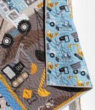 Modern construction themed baby quilt with digger and dozer panel, professionally quilted with coordinating borders, handmade by Kristin Blandford Designs for nursery decor and baby gifts