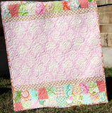 Digital baby quilt sewing pattern – make a tumbler charm quilt for a cozy handmade baby gift, beginner-friendly design.